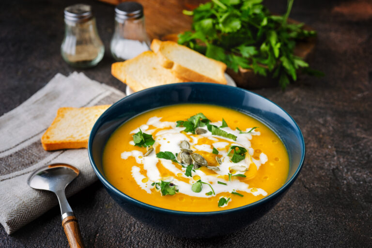 pumpkin-soup-with-cream-parsley-dark-rustic-table-768x512.jpg